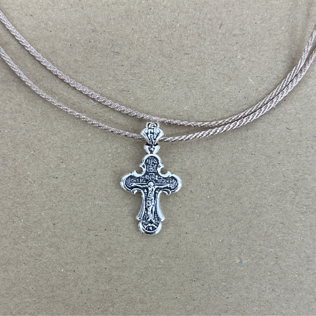 METAL CROSS PENDANT WITH BROWN CORD IN WHITE POUCH - 10 pcs