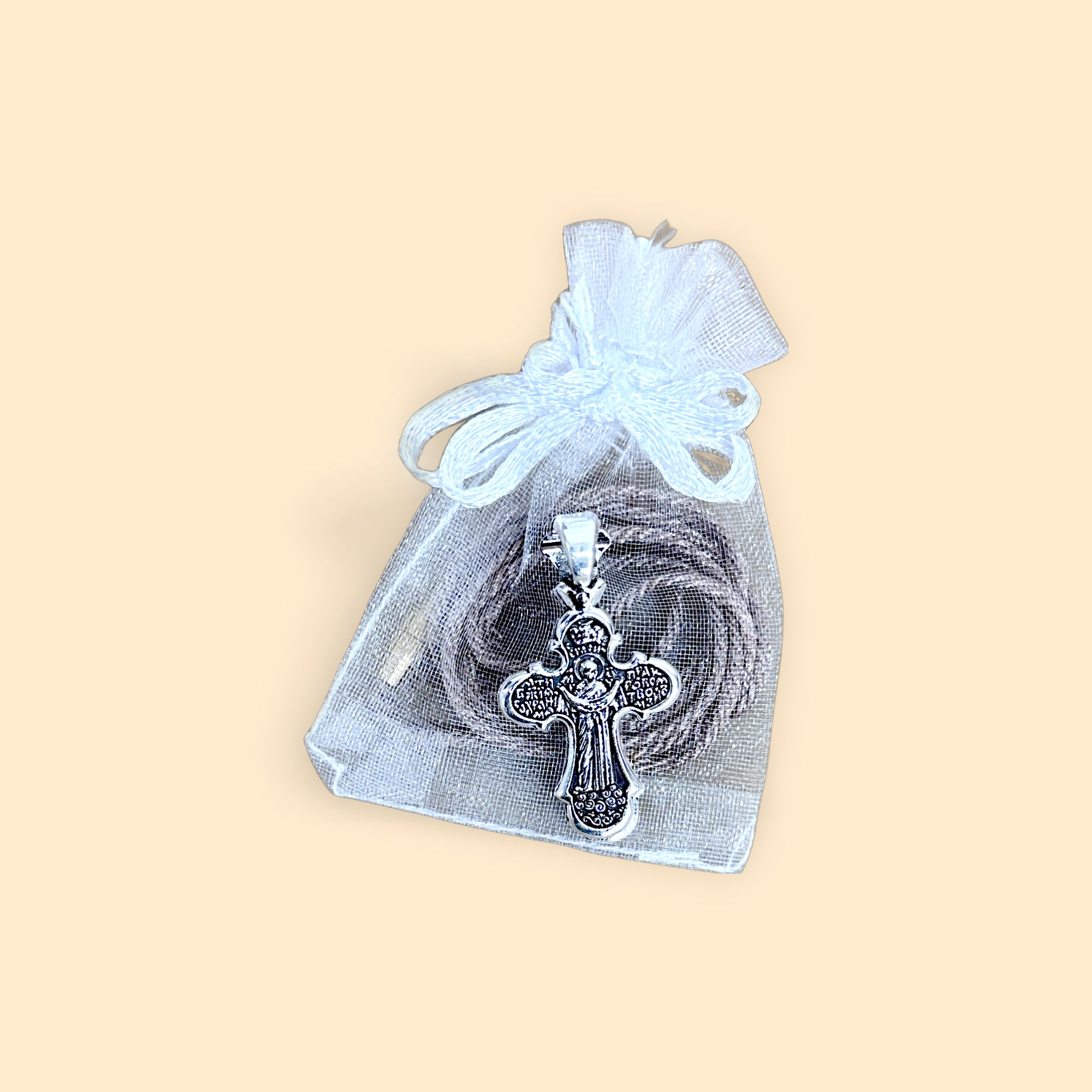 METAL CROSS PENDANT WITH BROWN CORD IN WHITE POUCH - 10 pcs